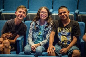 Three campers smile for photo in BPAC