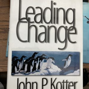book cover- shows penguins jumping into the water