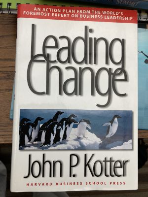 book cover- shows penguins jumping into the water