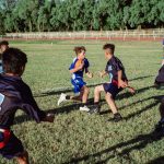 Image of students playing flag football from PDSD and ASDB