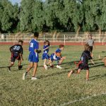 Photo of students playing flag football