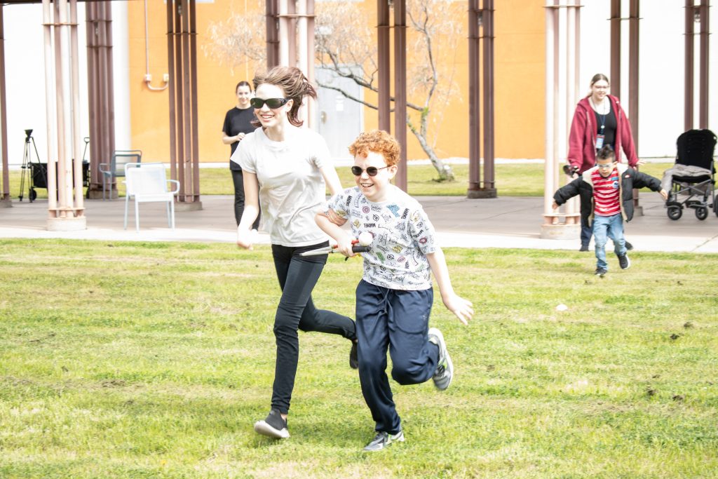 two students race together to find eggs