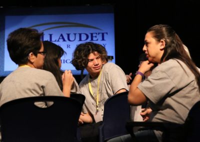 Boy meets with his Academic Bowl group