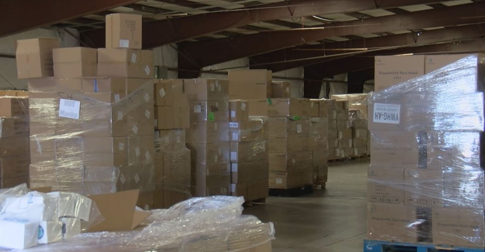A warehouse full of PPE boxes that are unopened